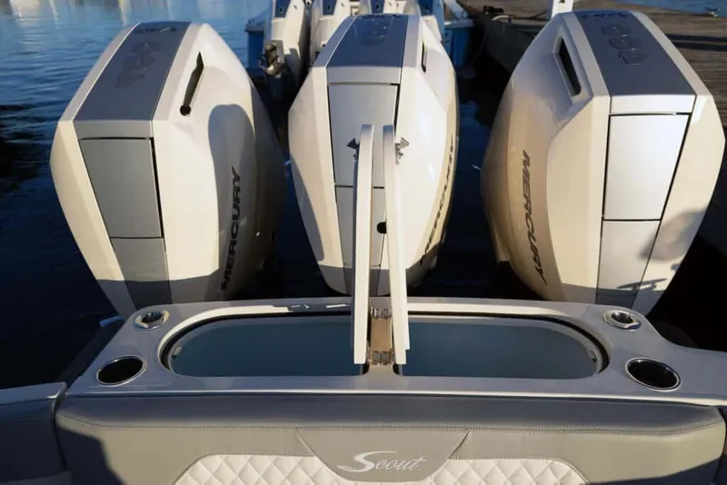 Slide: The Image of 2025 Scout 357 LXF boat with triple Mercury outboard engines. - 11