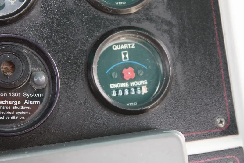 Slide: The Image of 1995 Carver 380 Santego engine hour meter showing 835 hours. - 29