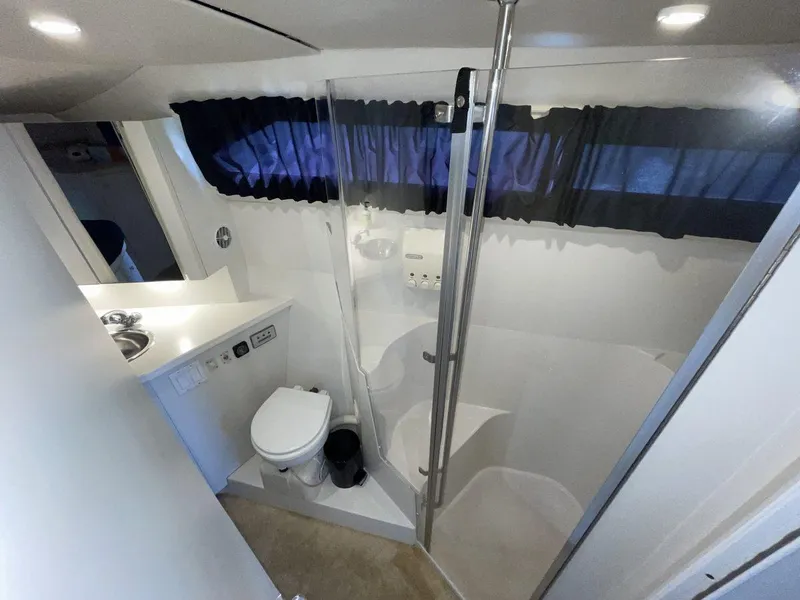 Slide: The Image of Bathroom interior of 1995 Carver 380 Santego yacht with shower and toilet. - 47