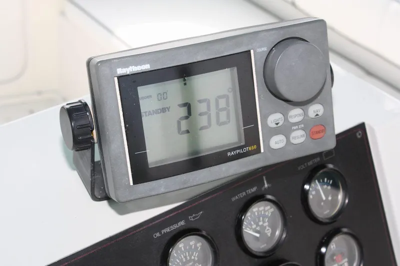 Slide: The Image of Raytheon autopilot display on 1995 Carver 380 Santego boat dashboard. - 25
