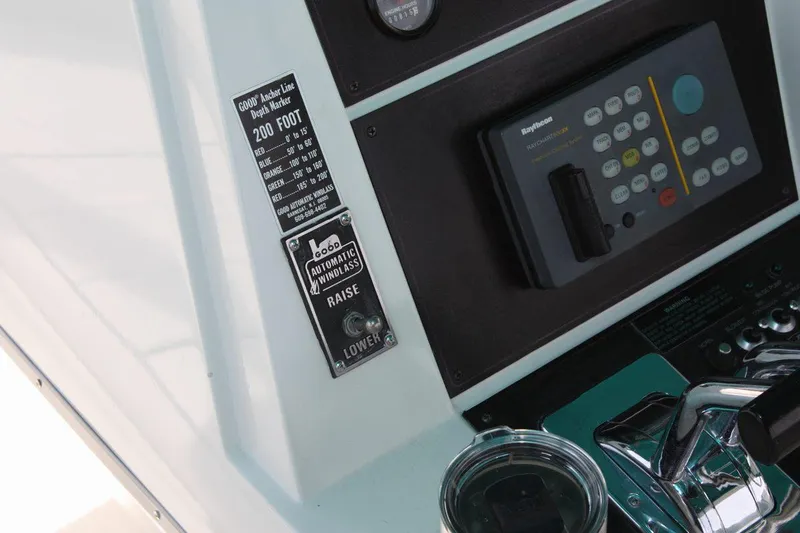 Slide: The Image of Control panel of a 1995 Carver 380 Santego boat with navigation equipment. - 27