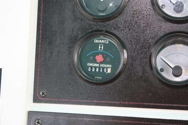 Slide: The Image of 1995 Carver 380 Santego engine hour meter displaying 815.6 hours. - 28