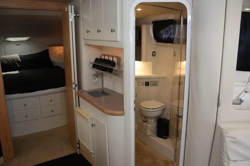 Slide: The Image of Interior of 1995 Carver 380 Santego yacht with bedroom and bathroom. - 41