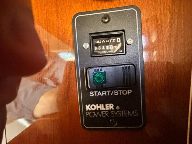 Slide: The Image of Kohler power system control panel on 2012 Sea Ray 260 Sundancer boat. - 7