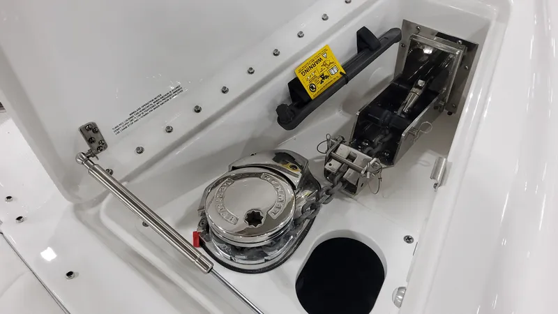 Slide: The Image of 2025 Formula 330 Crossover Bowrider OB anchor compartment detail. - 10