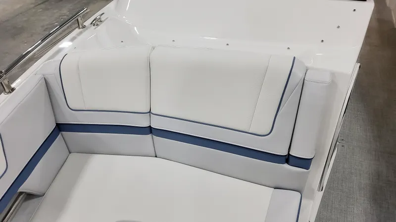 Slide: The Image of 2025 Formula 330 Crossover Bowrider OB, white and blue seating detail. - 19