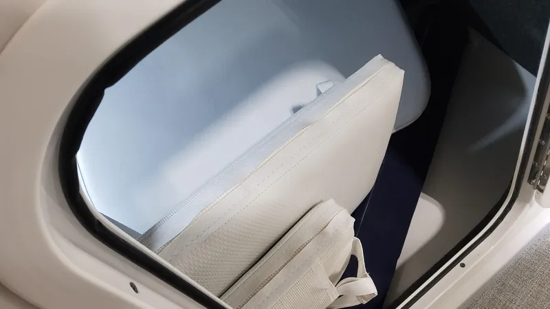 Slide: The Image of Storage compartment in 2025 Formula 330 Crossover Bowrider OB boat. - 23