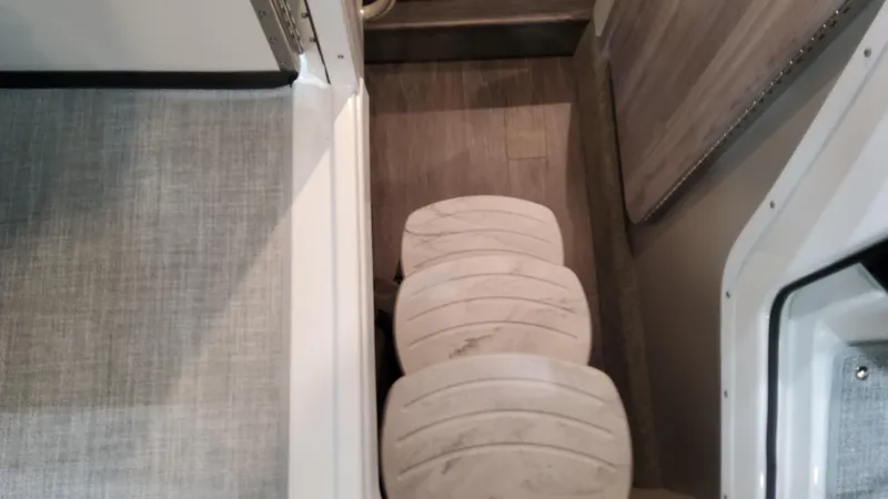 Slide: The Image of Interior steps of 2025 Formula 330 Crossover Bowrider OB, featuring modern design and wood finish. - 24