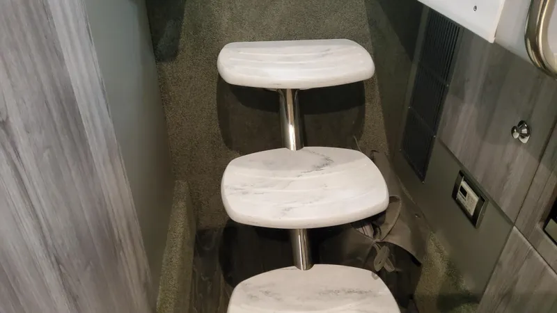 Slide: The Image of Interior steps of 2025 Formula 330 Crossover Bowrider OB, featuring sleek design and modern materials. - 33