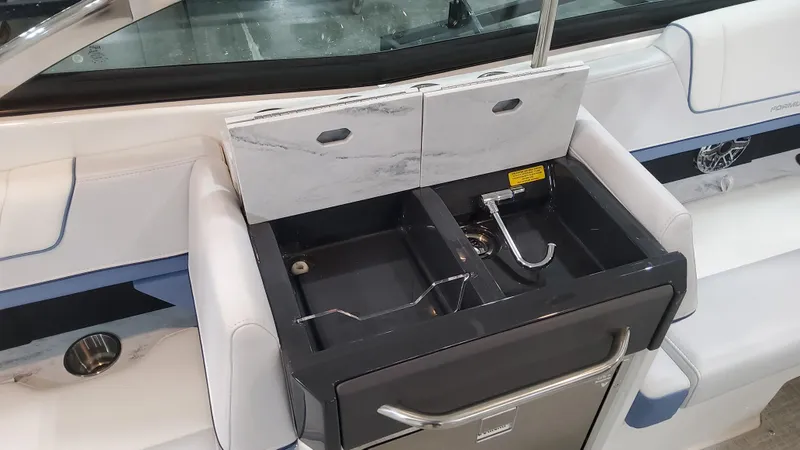Slide: The Image of 2025 Formula 330 Crossover Bowrider OB interior storage compartment. - 45