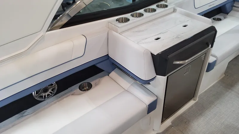 Slide: The Image of 2025 Formula 330 Crossover Bowrider OB interior with seating and storage. - 46