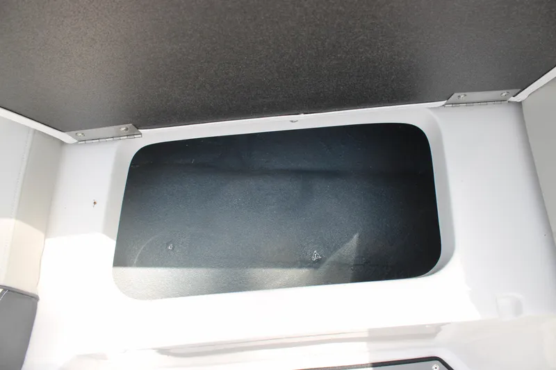 Slide: The Image of Interior view of a 2025 Starcraft 230 boat compartment. - 13