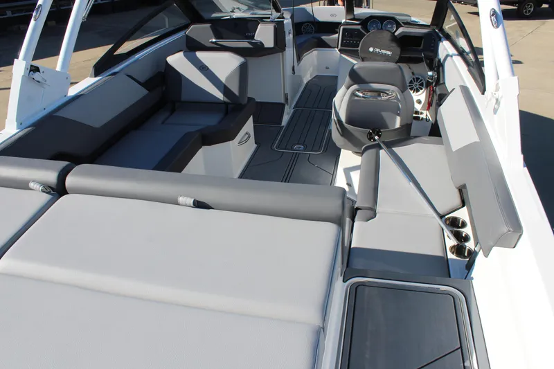 Slide: The Image of 2025 Cobalt CS23 boat interior with sleek seating and modern dashboard. - 10