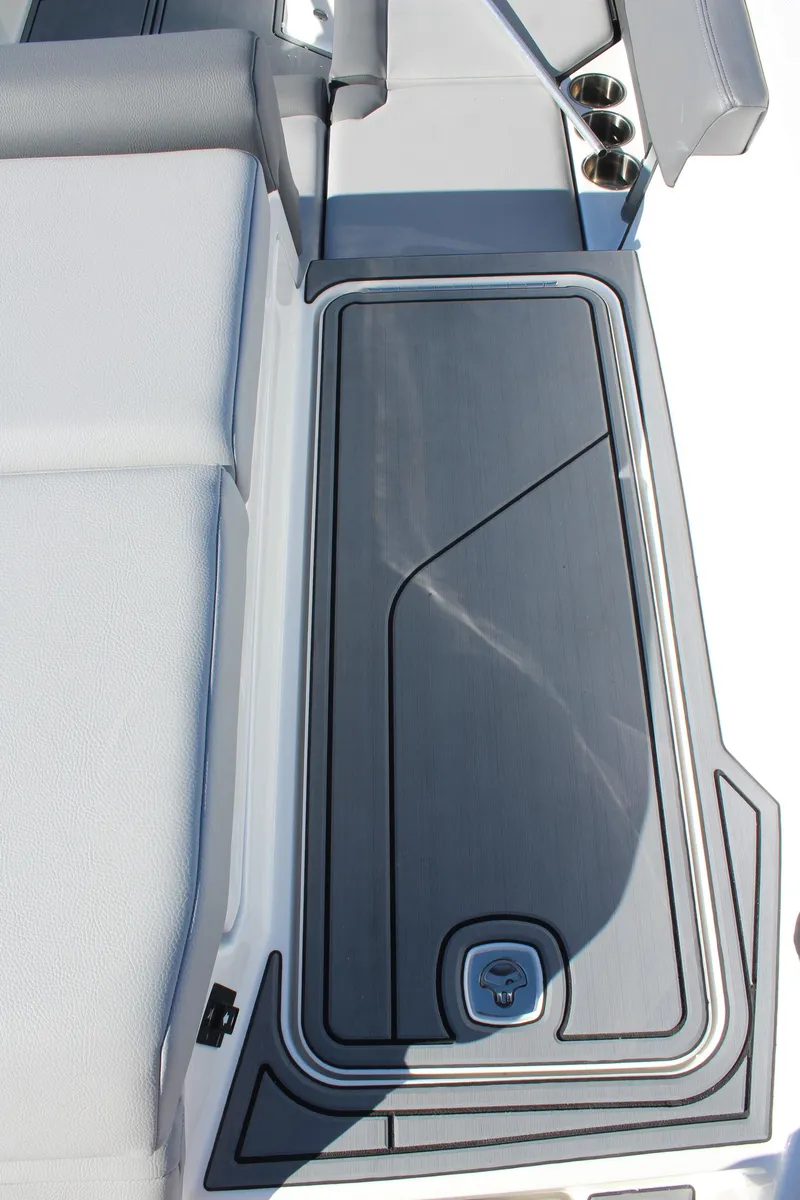 Slide: The Image of 2025 Cobalt CS23 boat deck with sleek design and modern features. - 11