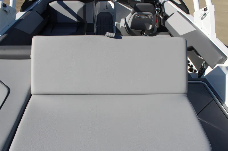 Slide: The Image of 2025 Cobalt CS23 boat interior with gray seating and modern design. - 14