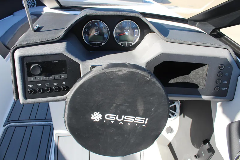 Slide: The Image of 2025 Cobalt CS23 boat dashboard with Gussi Italia steering wheel cover. - 22