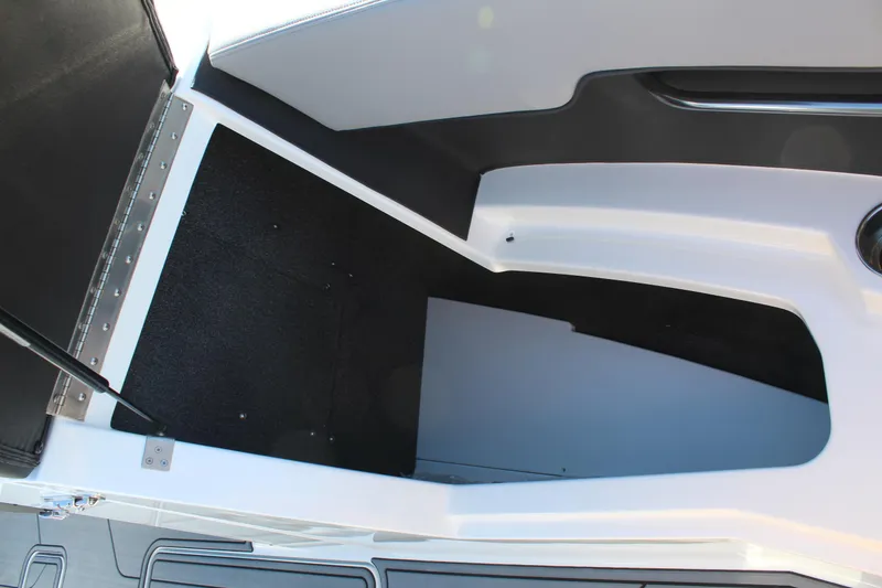 Slide: The Image of Interior view of 2025 Cobalt CS23 boat storage compartment. - 30