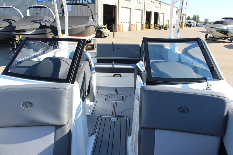Slide: The Image of 2025 Cobalt CS23 boat interior with sleek seating and modern design. - 31