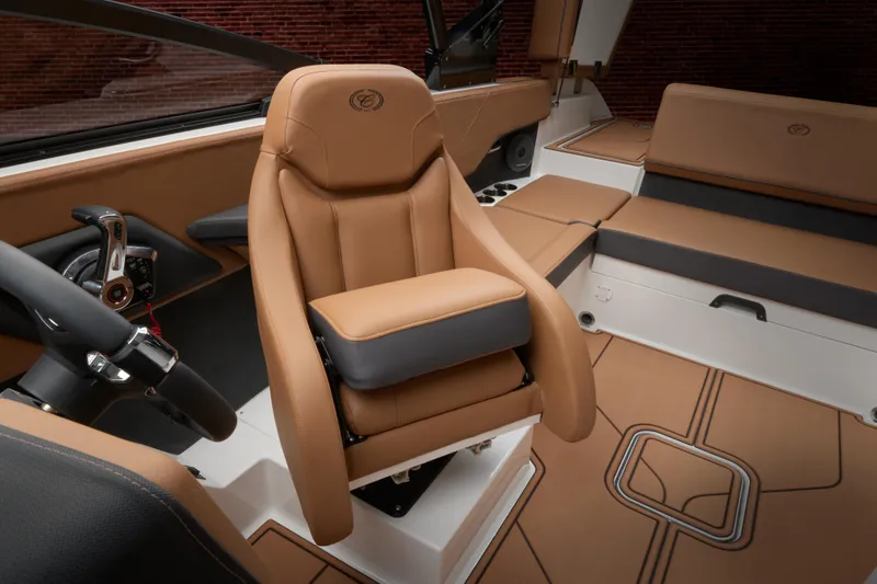 Slide: The Image of Luxurious interior of 2025 Cobalt CS23 boat with tan leather seating. - 40