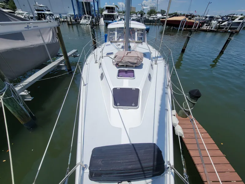 Slide: The Image of 2003 Catalina 42 Mk2 sailboat docked at marina, view from above. - 11