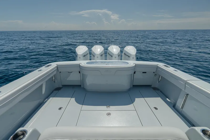 Slide: The Image of 2023 Valhalla Boatworks V-41 on open sea with four engines. - 15