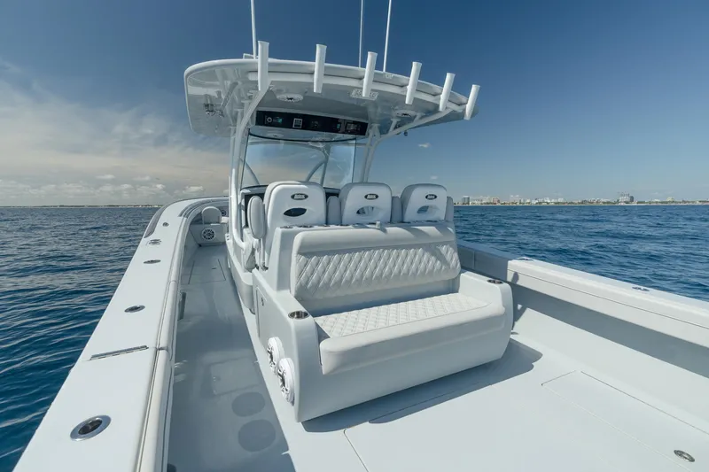 Slide: The Image of 2023 Valhalla Boatworks V-41 on open water, showcasing sleek design and seating. - 19