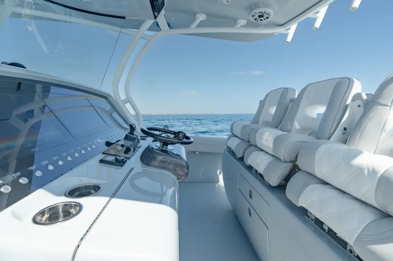 Slide: The Image of Interior of 2023 Valhalla Boatworks V-41, featuring sleek seating and modern controls. - 20
