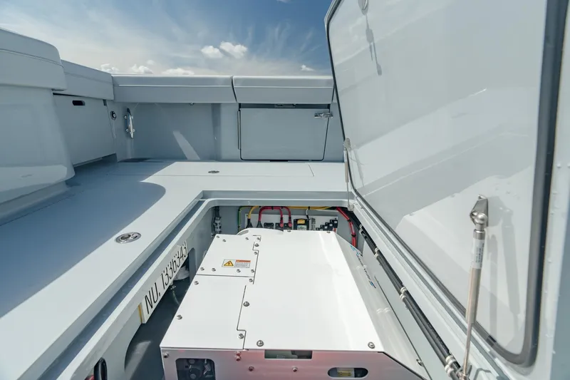 Slide: The Image of 2023 Valhalla V-41 boat storage compartment with open hatch, showcasing interior details. - 30