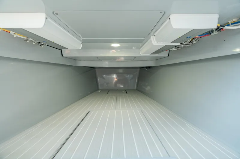 Slide: The Image of Interior view of 2023 Valhalla Boatworks V-41 cabin, showcasing spacious design and modern features. - 33