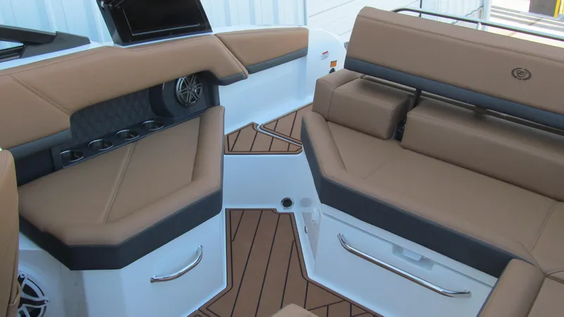 Slide: The Image of Luxurious interior of 2025 Cobalt R4 boat with tan leather seating and modern design. - 13