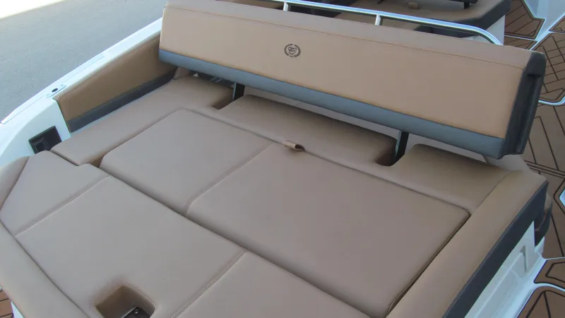 Slide: The Image of 2025 Cobalt R4 boat with tan leather seating and sleek design. - 15