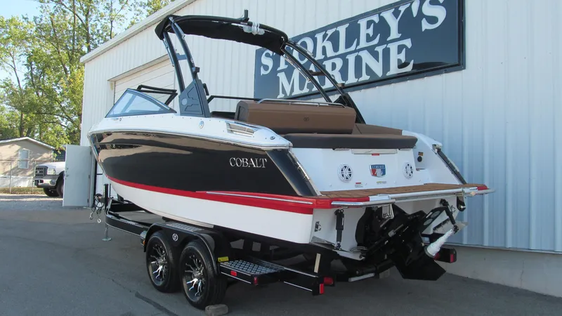 Slide: The Image of 2025 Cobalt R4 boat on trailer at Stokley's Marine dealership. - 3