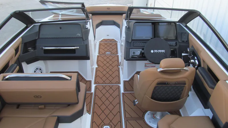 Slide: The Image of 2025 Cobalt R4 boat interior with modern dashboard and luxurious seating. - 5