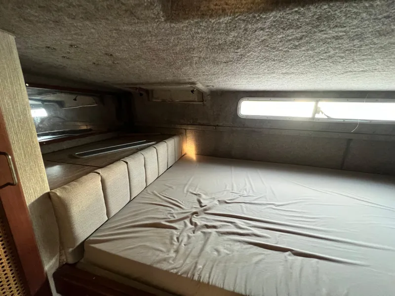 Slide: The Image of Interior cabin of 1985 Bayliner 3250 Conquest with bed and window. - 18