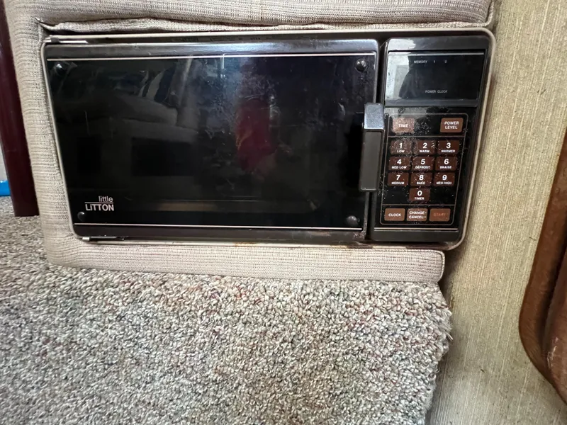 Slide: The Image of Built-in microwave in 1985 Bayliner 3250 Conquest boat interior. - 20