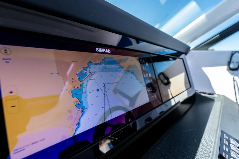Slide: The Image of Simrad navigation display on 2025 Axopar 29 Sun Top boat dashboard. - 8