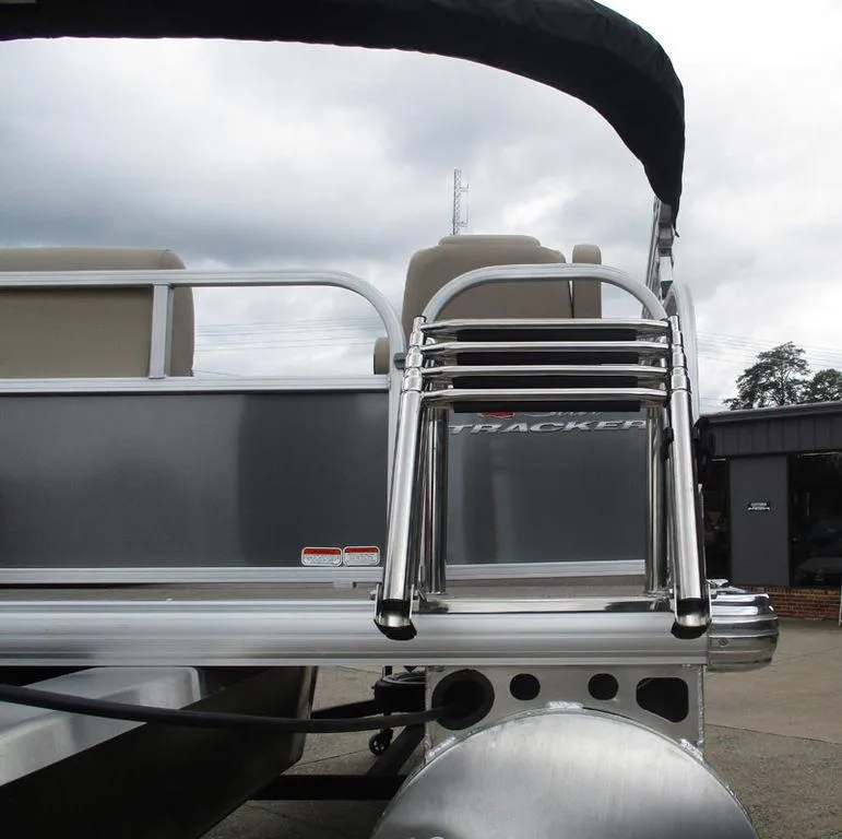 Slide: The Image of 2025 Sun Tracker PARTY BARGE® 16 DLX pontoon boat with sleek aluminum ladder. - 13