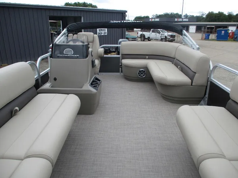 Slide: The Image of 2025 Sun Tracker PARTY BARGE® 16 DLX pontoon boat with spacious seating and modern design. - 6