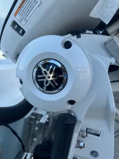 Slide: The Image of Close-up of 2025 Sportsman Masters 247 Bay Boat engine component. - 11