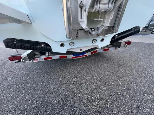 Slide: The Image of 2025 Sportsman Masters 247 Bay Boat on a trailer, rear view. - 13