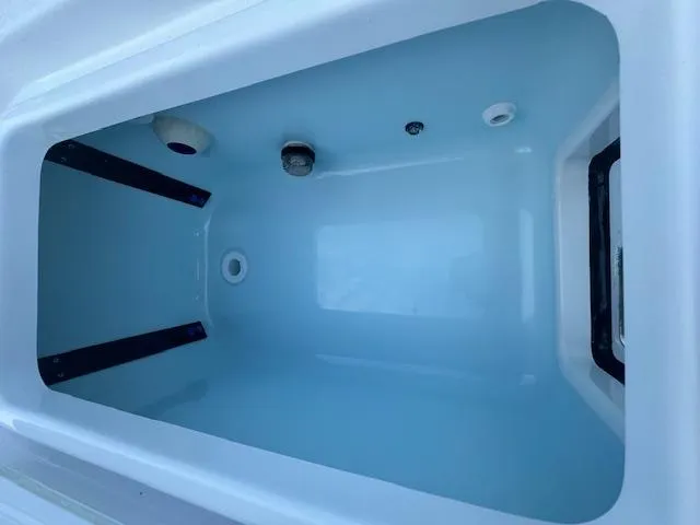 Slide: The Image of Livewell compartment in 2025 Sportsman Masters 247 Bay Boat. - 17