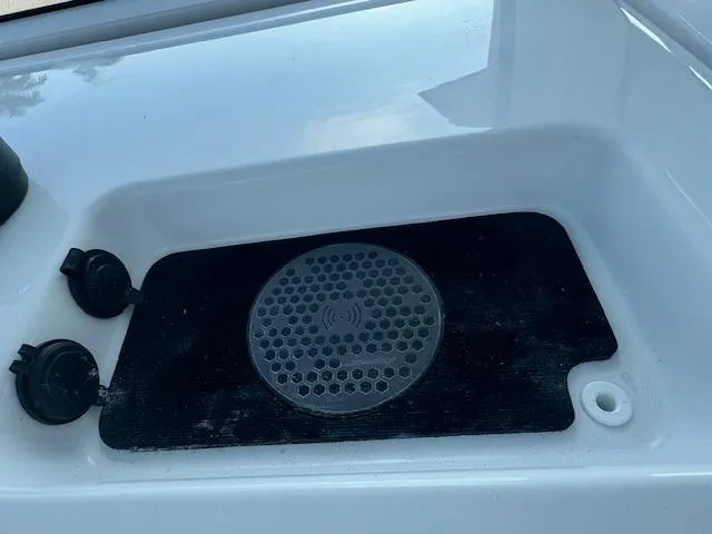 Slide: The Image of 2025 Sportsman Masters 247 Bay Boat console with speaker and controls. - 31