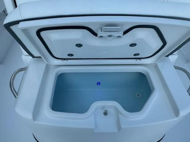 Slide: The Image of Open storage compartment on 2025 Sportsman Masters 247 Bay Boat. - 35