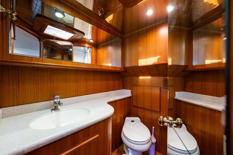 Slide: The Image of Luxurious wooden bathroom interior on 2000 Symbol 42 Classic Trawler yacht. - 22