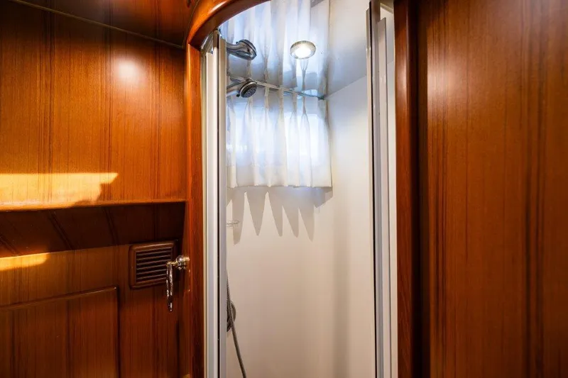 Slide: The Image of Wood-paneled shower area in 2000 Symbol 42 Classic Trawler yacht. - 23