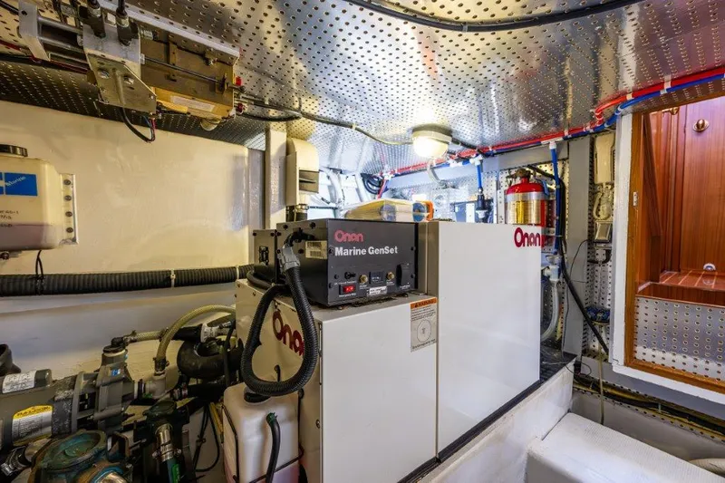 Slide: The Image of Engine room of 2000 Symbol 42 Classic Trawler with Onan Marine Generator. - 35