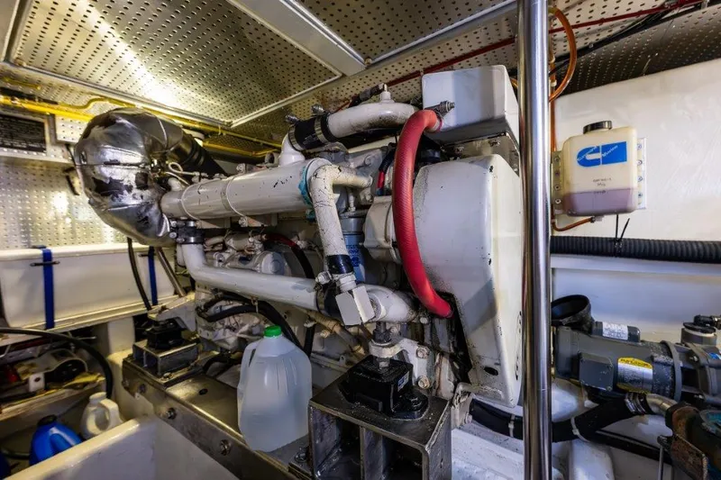 Slide: The Image of Engine room of 2000 Symbol 42 Classic Trawler with visible machinery and components. - 36