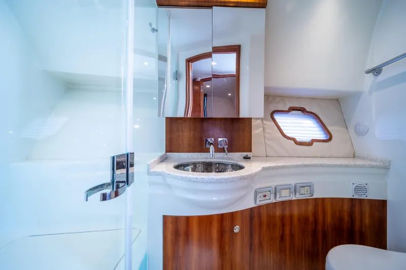 Slide: The Image of Luxurious bathroom interior of 2011 SeaVee 430 Sport Express yacht with modern fixtures. - 28
