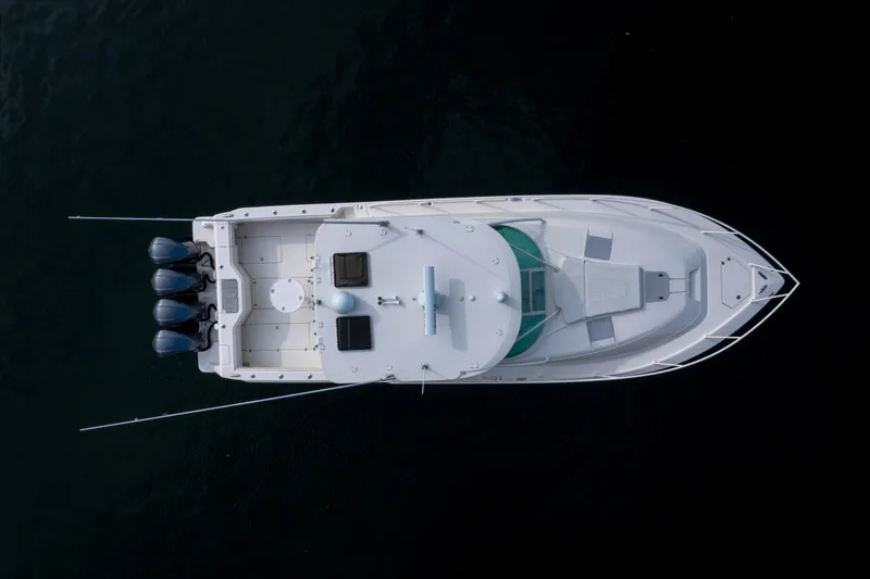 Slide: The Image of Aerial view of 2011 SeaVee 430 Sport Express boat on dark water. - 4
