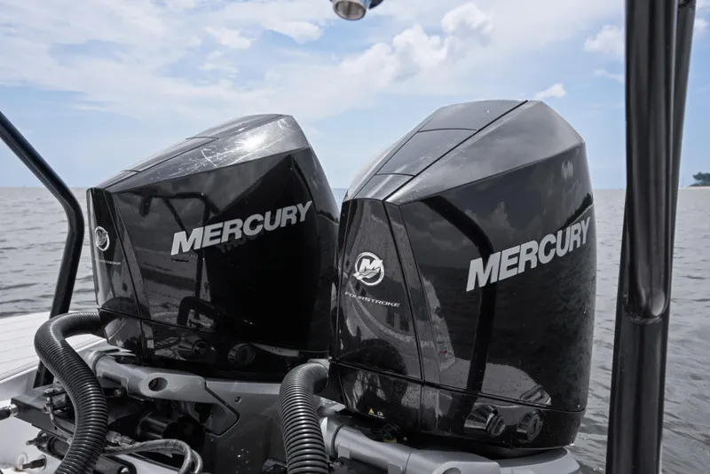 Slide: The Image of Twin Mercury outboard engines on 2023 Axopar 37XC CROSS CABIN boat. - 21